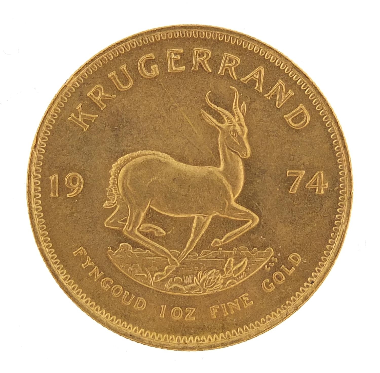 South African 1974 gold krugerrand - this lot is sold without buyer?s premium, the hammer price is