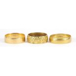 Gold rings comprising two 18ct gold, size O and T, 9.0g and one other with indistinct marks, size R,