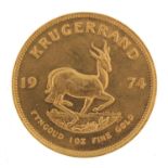 South African 1974 gold krugerrand - this lot is sold without buyer?s premium, the hammer price is