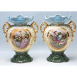 PAIR OF ANTIQUE EARLY 20TH CENTURY VASES HAVING A