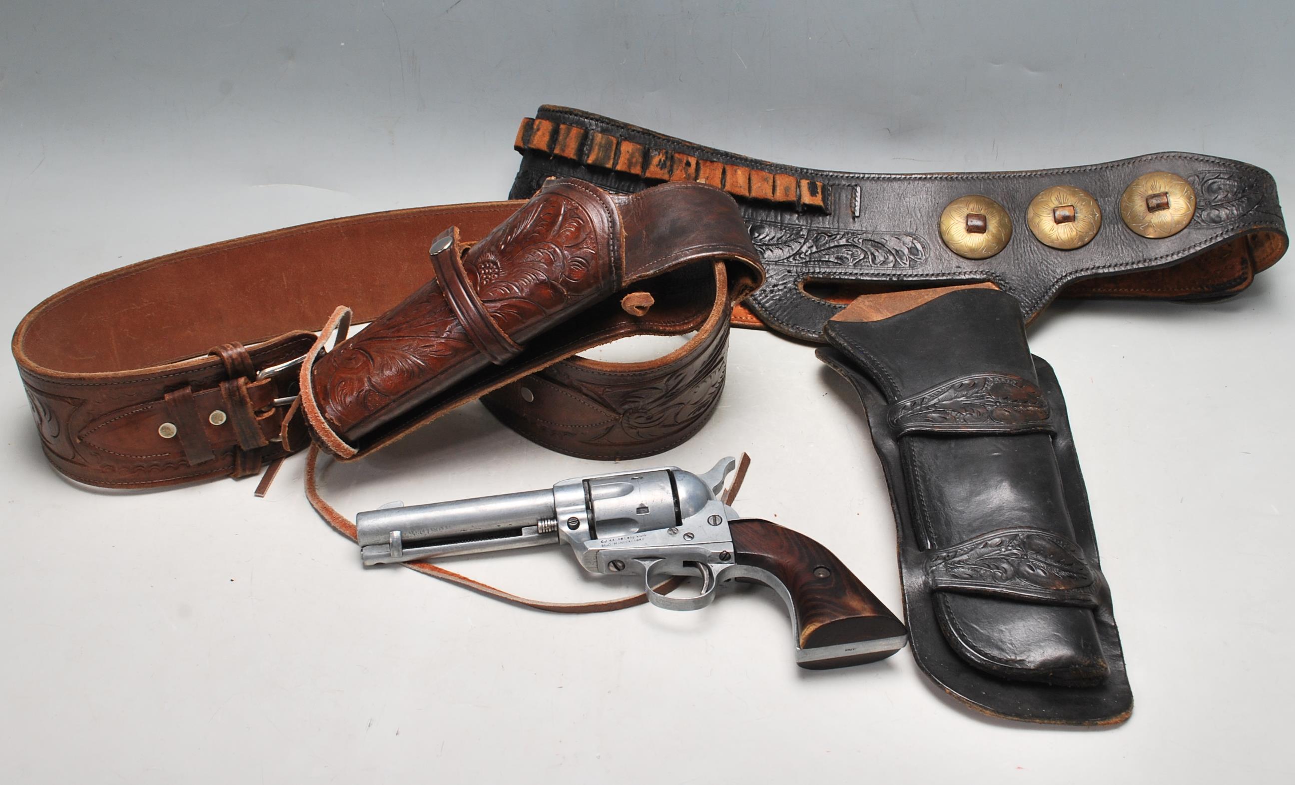 PAIR OF 20TH CENTURY BLACK AND BROWN LEATHER COWBOY GUN HOLSTER