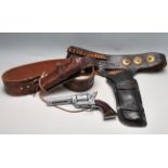 PAIR OF 20TH CENTURY BLACK AND BROWN LEATHER COWBOY GUN HOLSTER