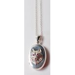 SILVER AND RED STONE WOLF LOCKET NECKLACE