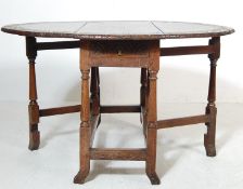 19TH CENTURY CARVED OAK JACOBEAN DROP LEAF TABLE