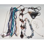 FIFTEEN CONTEMPORARY BEADED AND SILVER NECKLACES