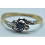 ANTIQUE 18CT GOLD AND SAPPHIRE CROSS OVER RING