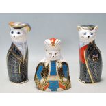 THREE ROYAL CROWN DERBY 'ROYAL CATS' FIGURINES TO INCLUDE PEARLY KING, PEARLY QUEEN AND PERSIAN.