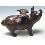 LATE 20TH CENTURY BRONZE FLYING PIG