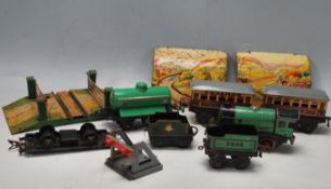 COLLECTION OF LATE 20TH CENTURY 0 GUAGE TINPLATE CLOCKWORK LOCOMOTIVE TRAINS