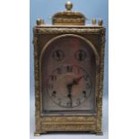 ANTIQUE LATE 19TH CENTURY BRASS CASED CLOCK WITH GOTHIC STYLING