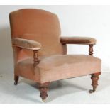 VICTORIAN 19TH CENTURY OAK HOWARD AND SONS TYPE EASY CHAIR.