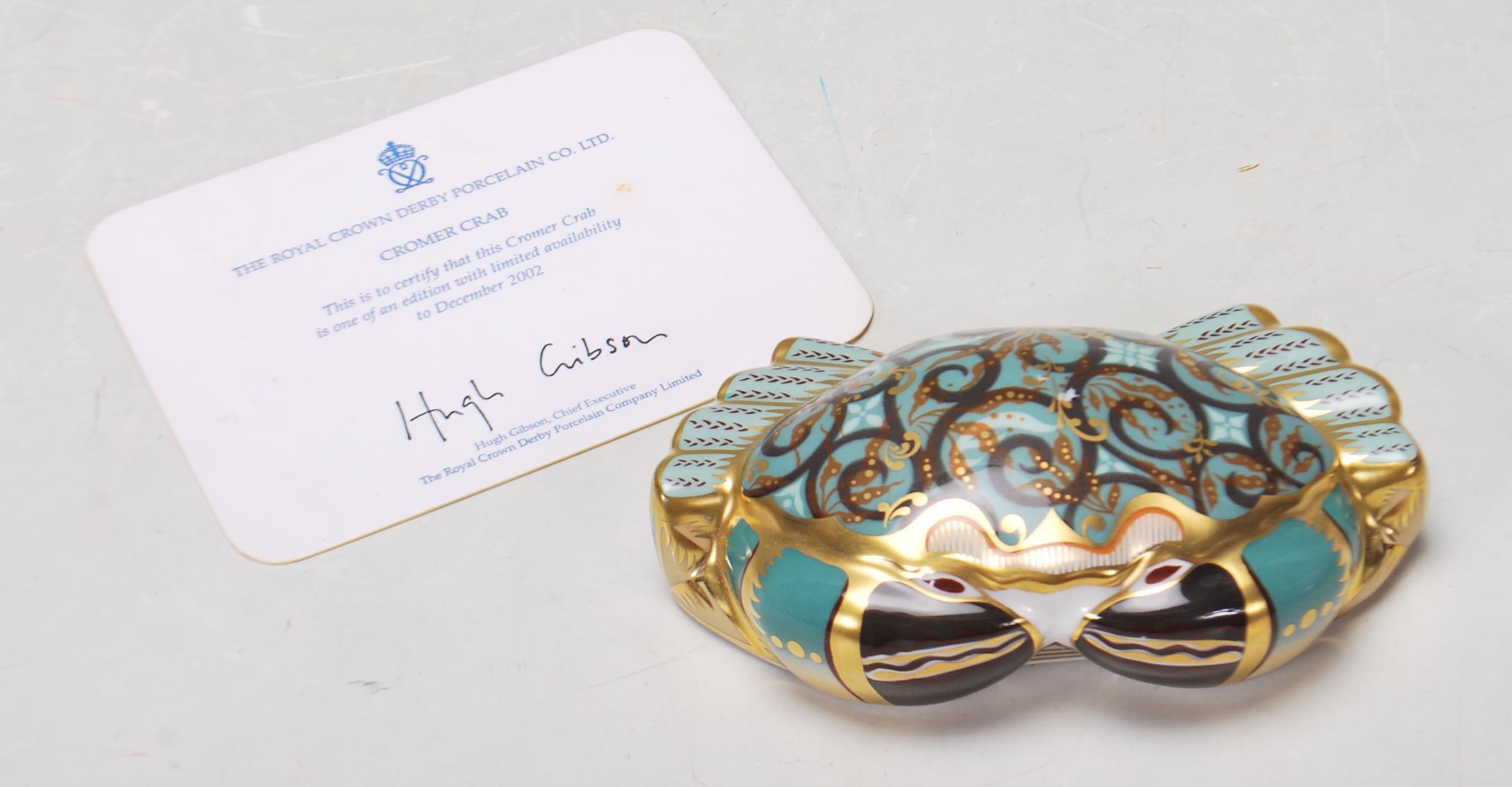 ROYAL CROWN DERBY PAPERWEIGHT IN A FORM OF A CROMER CRAB WITH GOLD STOPPER