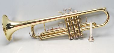 BRASS STAGG 77-T THREE VALVE TURMPET WITH ORIGINAL CARRY CASE.