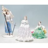 A THREE CERAMIC PORCELAIN LADY FIGURINES - ROYAL DOULTON - ROAYAL WORCESTER - COALPORT