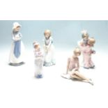 FIVE VINTAGE NAO BY LLADRO CERAMIC FIGURINES