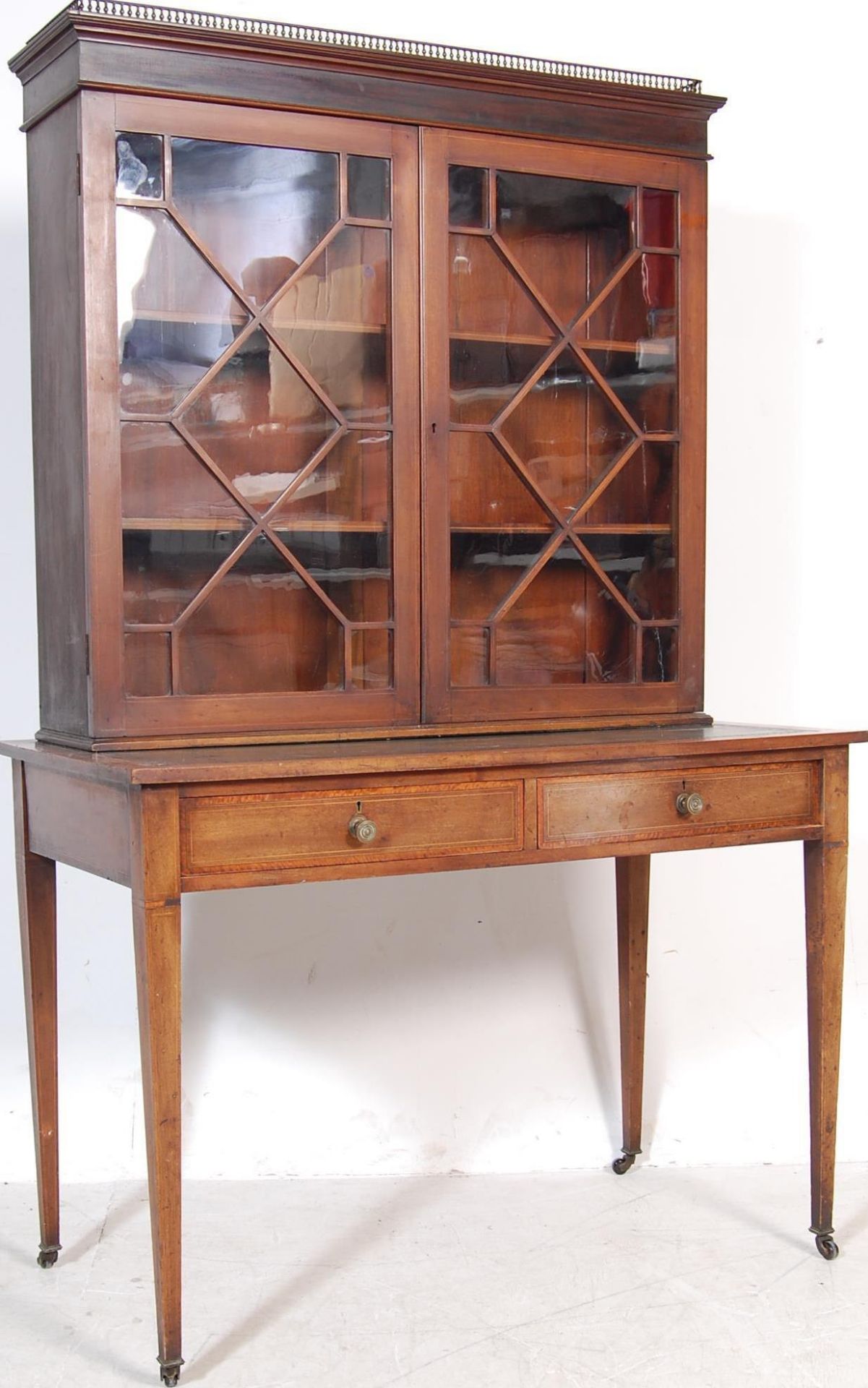 EDWARDIAN MAHOGANY AND LEATHER INLAID WRITING DESK, TOGETHER WITH MATCHING BOOKCASE.