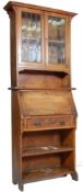 19TH CENTURY / EARLY 20TH CENTURY ARTS AND CRAFT LIBERTY STYLE BUREAU BOOKCASE.