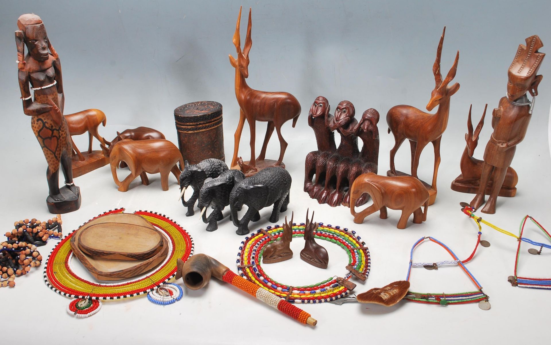 LARGE QUANTITY OF HARDWOOD AFRICAN TRIBAL ANIMALS FIGURINES AND NECKLACES