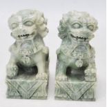 TWO 20TH CENTURY GREEN HARDSTONE FU DOGS / TEMPLE LIONS