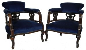 TWO 19TH CENTURY VICTORIAN CARVED MAHOGANY FRAMED TUB CHAIR WITH BLUE VELVET UPHOLSTERY