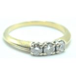 CONTEMPORARY 18CT GOLD AND DIAMOND THREE STONE RING