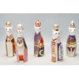 FIVE ROYAL CROWN DERBY FIGURINES FROM THE 'ROYAL CATS' SERIES; ABYSSINIAN, BURMESE, EQGYPTIAN ETC.