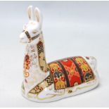 ROYAL CROWN DERBY PAPERWEIGHT IN A FOM OF LLAMA WITH GOLD STOPPER