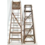 TWO VINTAGE LATE 20TH CENTURY A FRAME WOODEN LADDERS