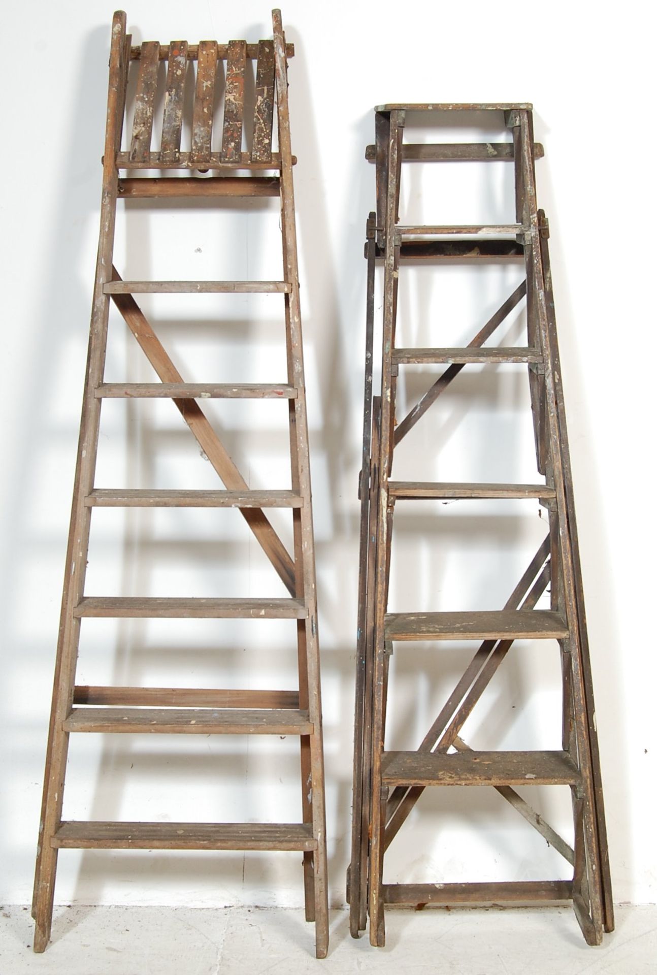 TWO VINTAGE LATE 20TH CENTURY A FRAME WOODEN LADDERS