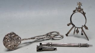 20TH CENTURY SILVER TONGS AND MORE
