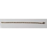 9CT GOLD EMERALD AND DIAMOND LINE TENNIS BRACELET