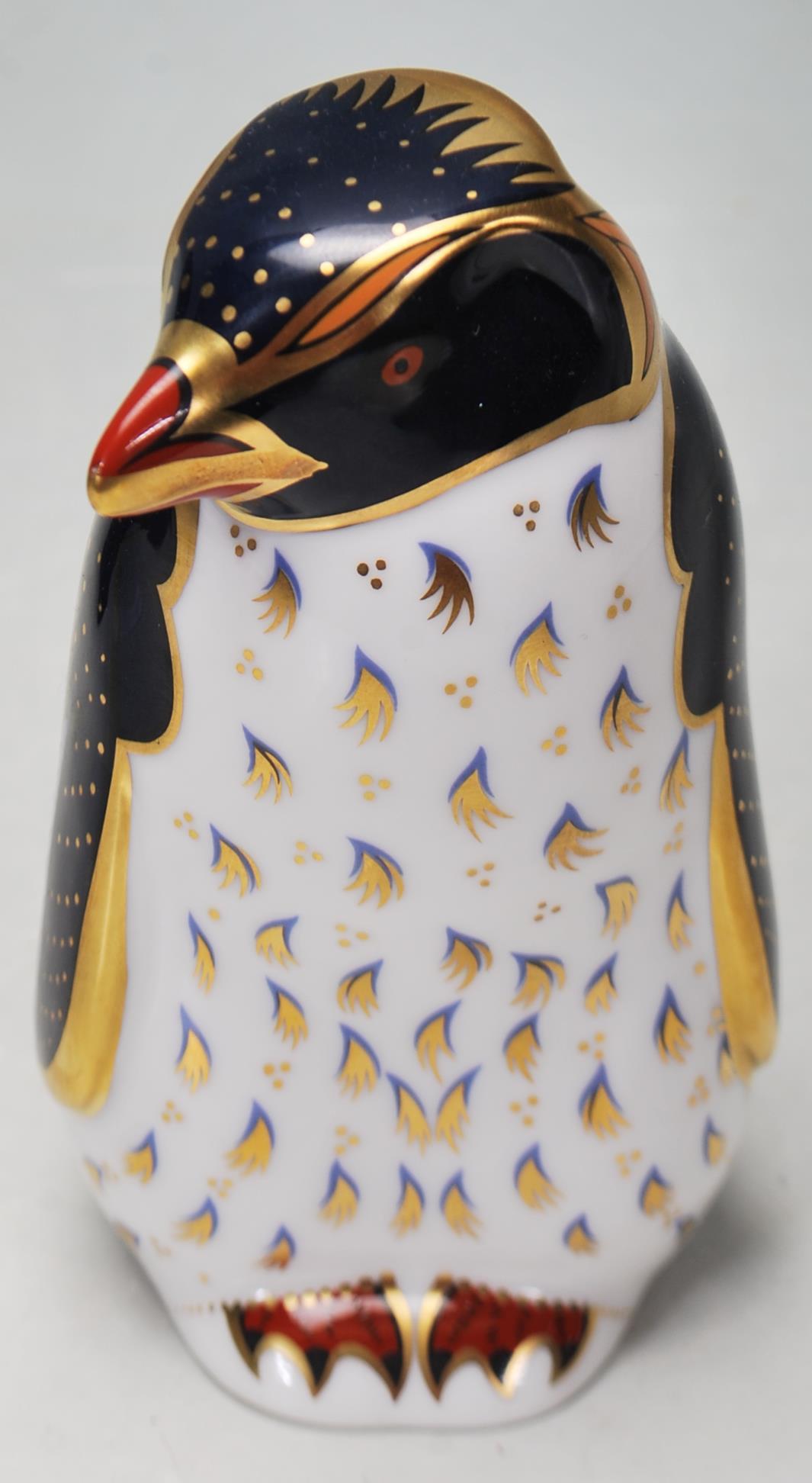A ROYAL CROWN DERBY ROCKHOPPER PENGUIN PAPERWEIGHT WITH GOLD STOPPER - Image 2 of 7