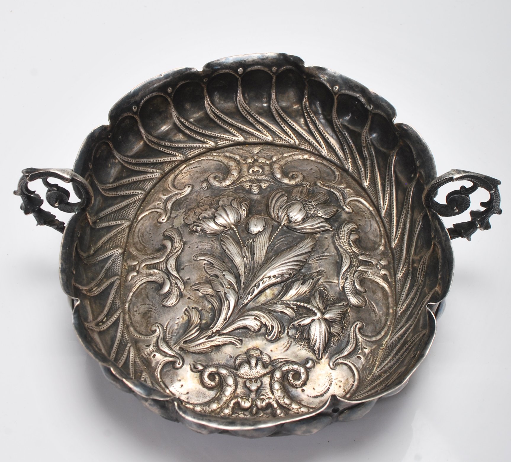 ANTIQUE SILVER TWIN HANDLED FLORAL DISH