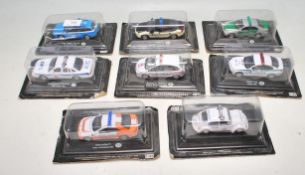 EIGHT VINTAGE DIECAST 1:43 POLICE CARS