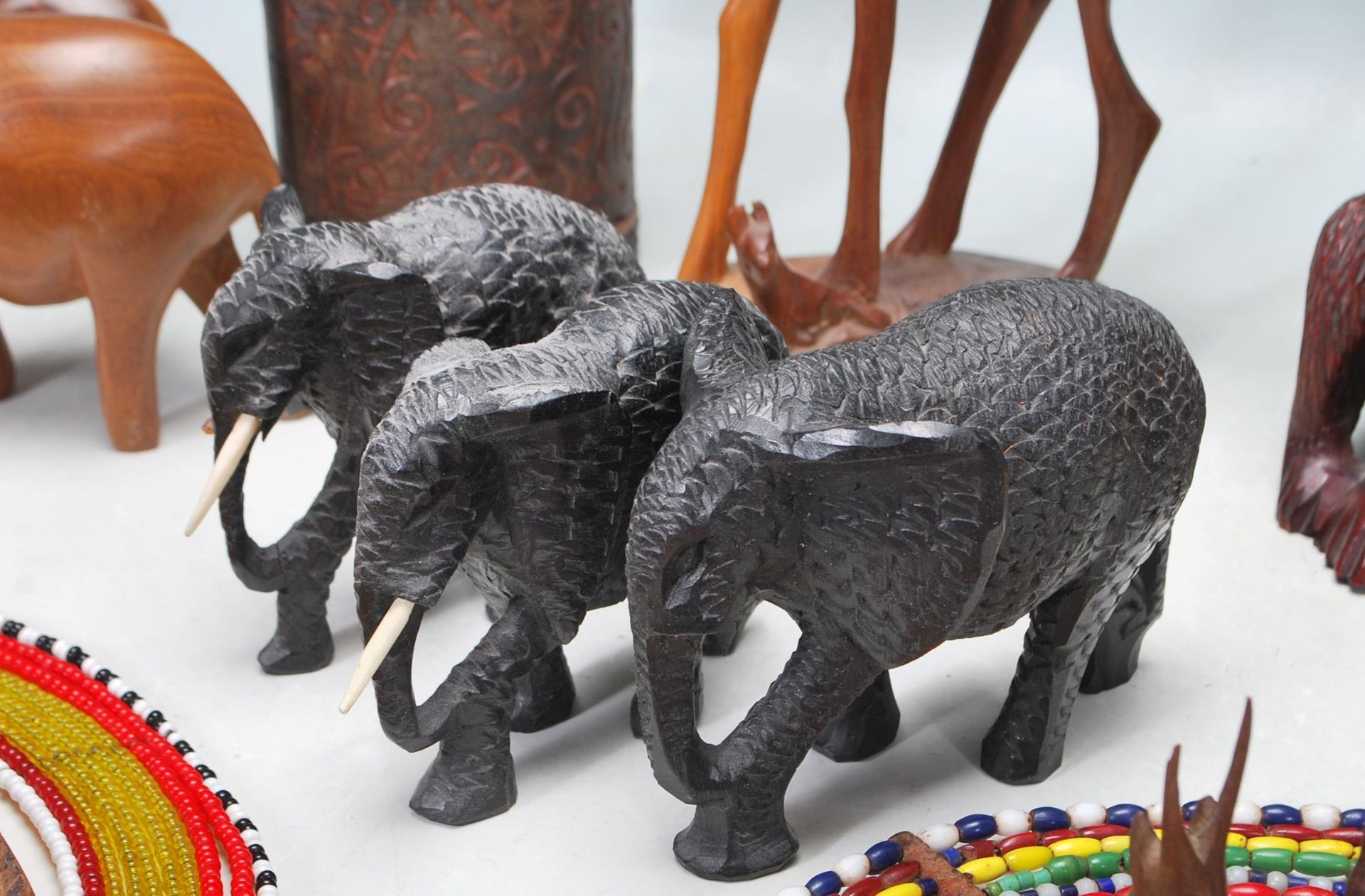 LARGE QUANTITY OF HARDWOOD AFRICAN TRIBAL ANIMALS FIGURINES AND NECKLACES - Image 5 of 11