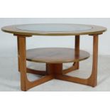 RETRO 1970’S TEAK WOOD REMPLOY COFFEE TABLE OF A CIRCULAR FORM