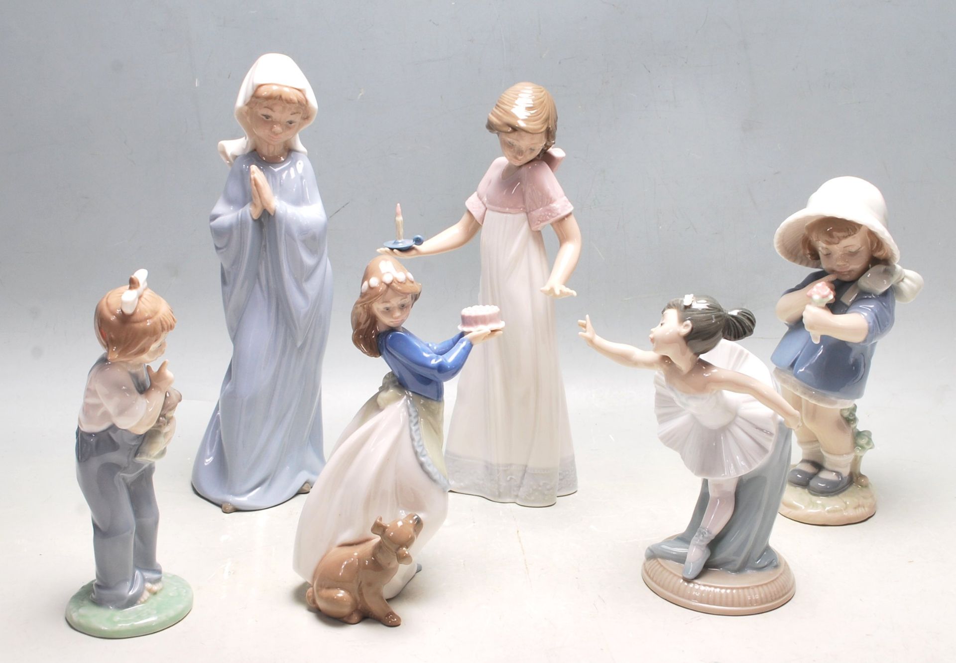 SIX VINTAGE NAO BY LLADRO CERAMIC FIGURINES