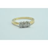 18CT / 750 GOLD AND 3 STONE DIAMOND RING