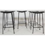 FIVE RETRO BLACK BAR STOOLS IN BLACK LEATHER AND TUBULAR METAL.