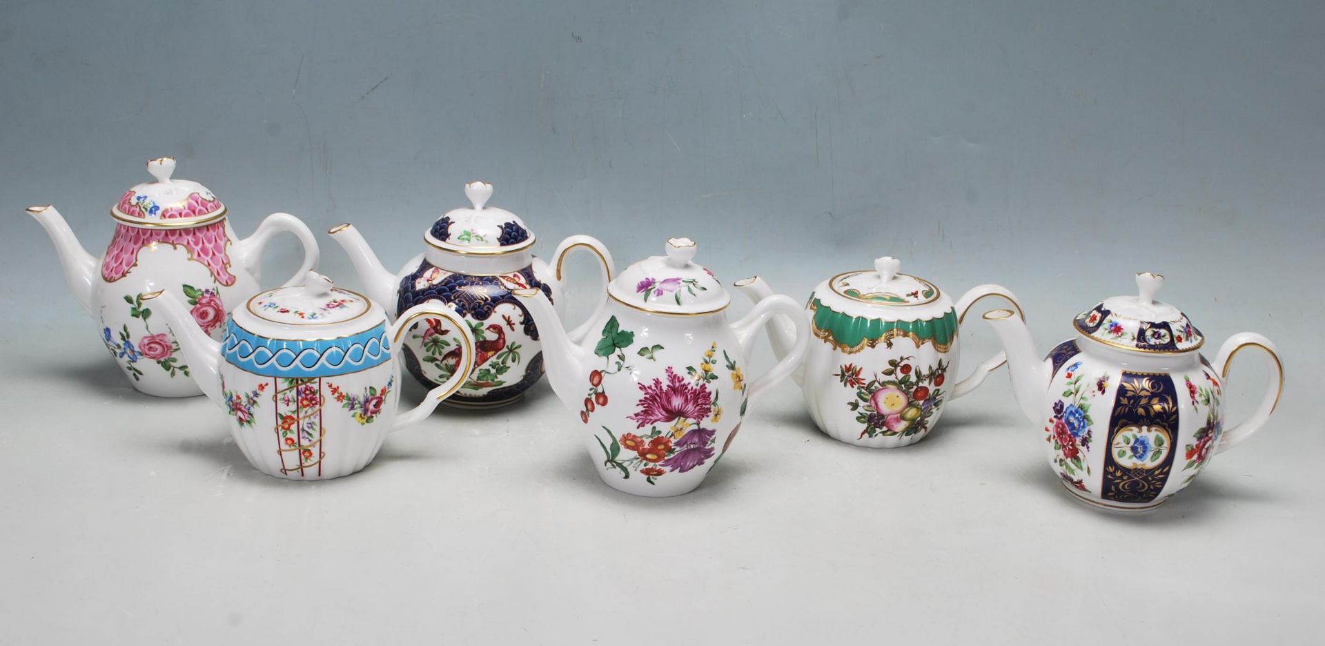 A COLLECTION OF SIX LIMITED EDITION HEIRLOOM WORCESTER TEAPOTS