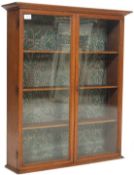 EARLY 20TH CENTURY OAK TABLE TOP CABINET BOOKCASE WITH GLAZED DOORS