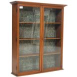 EARLY 20TH CENTURY OAK TABLE TOP CABINET BOOKCASE WITH GLAZED DOORS