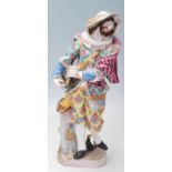A BELIEVED 18TH CETURY MEISSEN STYLE CERAMIC PORCELAIN FIGURINES WITH MEISSEN BLUE CROSSED SWARD