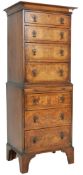 EARLY 20TH CENTURY GEORGIAN REVIVAL WALNUT TALLBOY CHEST ON CHEST OF DRAWERS OF NARROWN PROPORTIONS