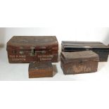 TWO EARLY 20TH CENTURY METAL SHIPPING TRUNKS ALONG WITH TWO SMALL TOOL BOXES WITH VINTAGE TOOLS