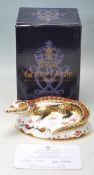 ROYAL CROWN DERBY PAPERWEIGHT IN A FORM OF CROCODILE WITH GOLD STOPPER