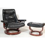 EKORNES STRESSLESS LEATHER RECLINING ARMCHAIR AND OTTOMAN