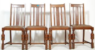 A SET OF FOUR MID CENTURY 1930’S STYLE OAK DINING CHAIRS WITH LEATHER SEATS