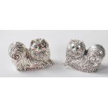 A PAIR OF SILVER PLATED CAT SALT AND PEPPER SHAKERS