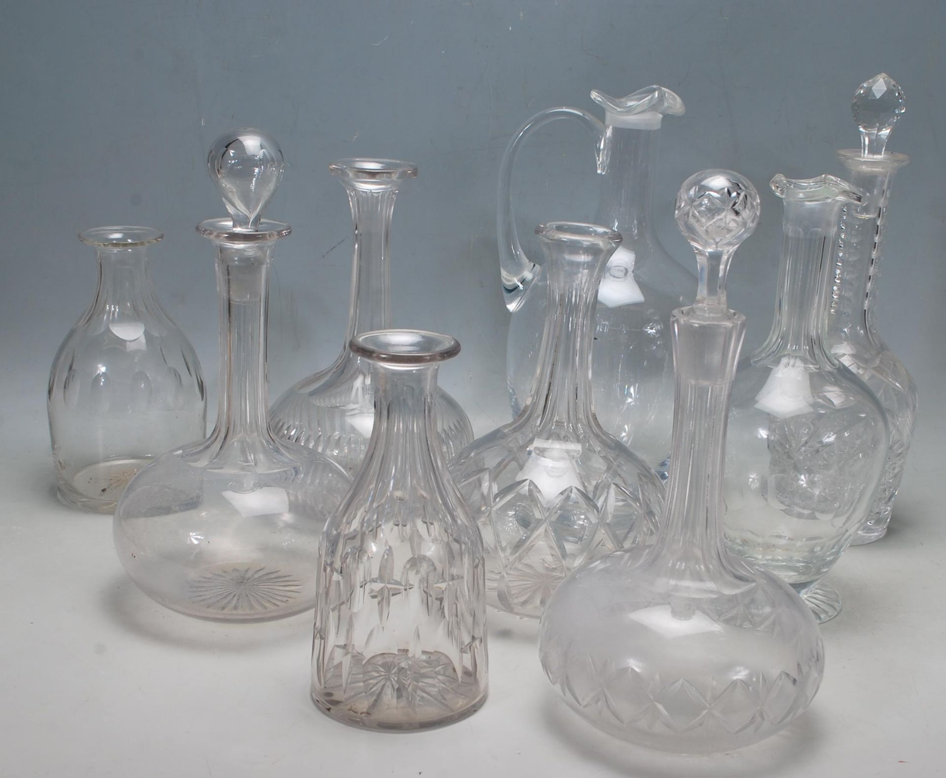 NINE 19TH CENTURY VICTORIAN CUT GLASS DECANTERS